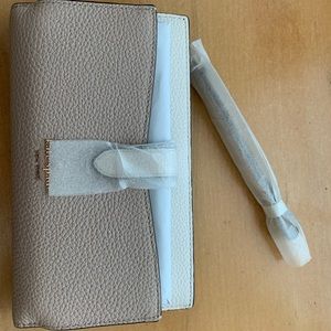 Kate Spade Leila medium phone wristlet wallet in warm beige BRAND NEW!!